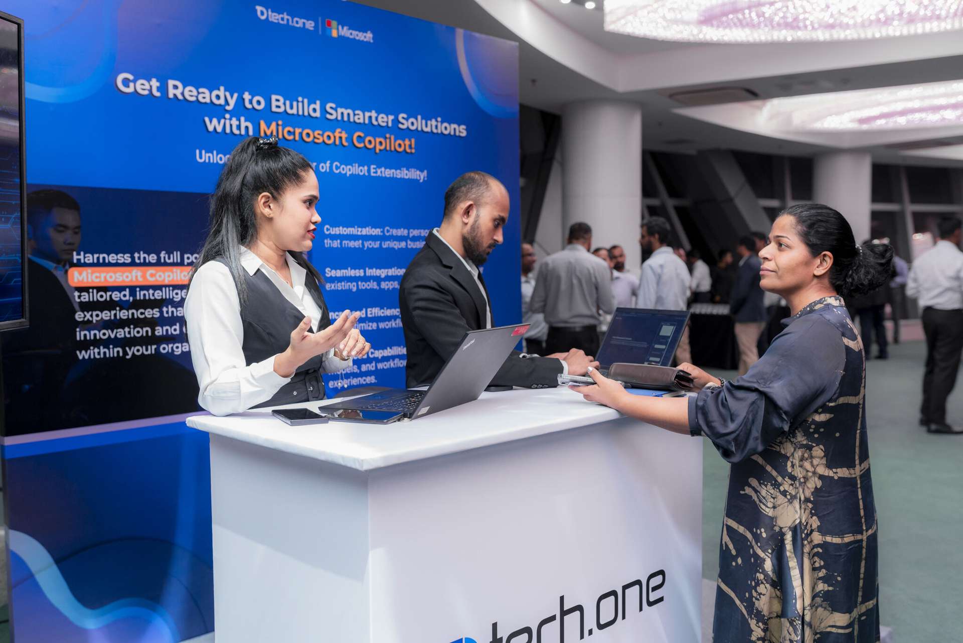 Aisha at Tech One Global Microsoft Copilot launch event booth